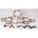 A set of three Beswick graduated swallow wall plaques; together with a Paragon Majestic pattern