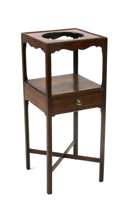 A Georgian oak two-tier washstand on square chamfered legs, 33cms (13ins) wide.