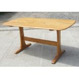 An Ercol mid century 1193 Windsor blond oak refectory table, 148cms (58ins) long.Condition