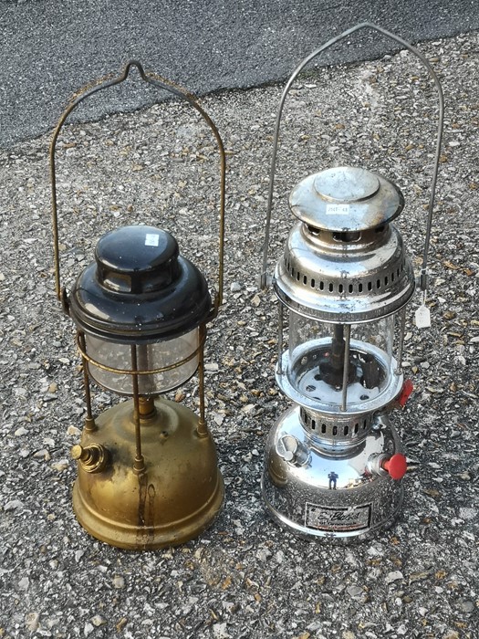 An Anchor chrome bodied Tilly lamp and another Tilly lamp (2).
