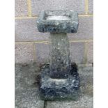 A three-section stone birdbath, 61cms (24ins) high.