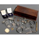 A quantity of mainly silver jewellery to include brooches, bangles and rings; together with two