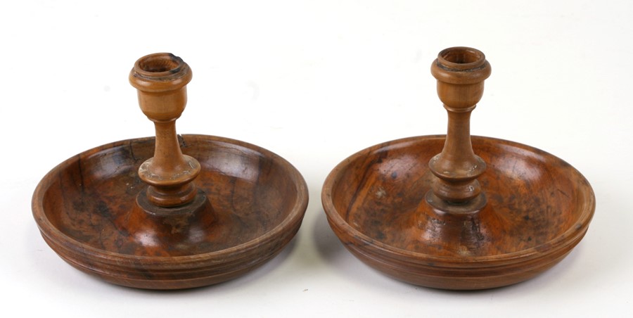 A Jerusalem olivewood 'Brighton Bun' travelling candlestick.