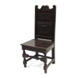 An oak Wainscot style chair.