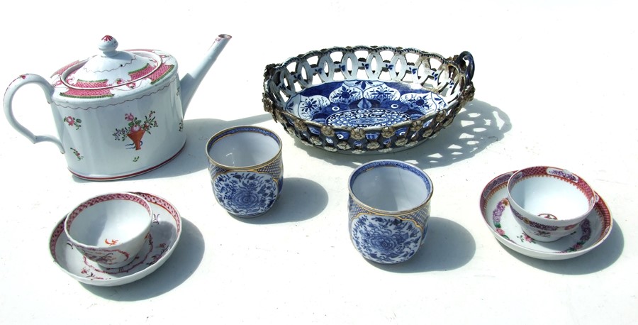 Two 18th century tea bowls and saucers; together with a pair of blue & white chocolate cups (missing