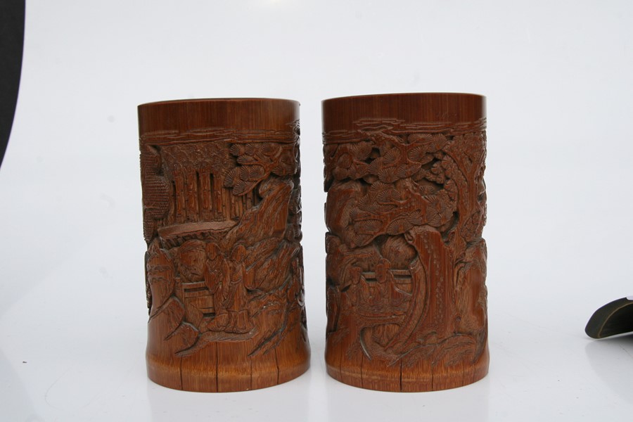 A pair of Chinese bamboo brush pots decorated with figures in a landscape, 15cms (6ins) high); - Image 6 of 10