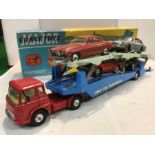 A Corgi Toys Major Carrimore Car Transporter, No. II05, with original box and four cars, a Corgi