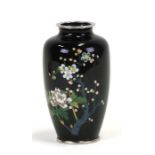 A Japanese Sato silver wire cloisonne vase decorated with flowers on a black ground, 12cms (4.75ins)