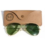 A pair of Bausch & Lomb Ray-Ban USA Aviator sunglasses, cased, unusually having etched mark to the