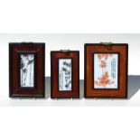 Three Chinese Republic style porcelain panels depicting bamboo and calligraphy, framed, the
