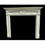 A 19th century style painted pine fire surround, 146cms (57.5ins) wide.Condition Reportexternal