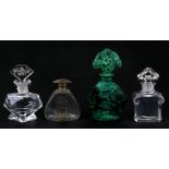 A group of four glass scent bottles to include a Baccarat example, the largest 15cms (6ins) high (