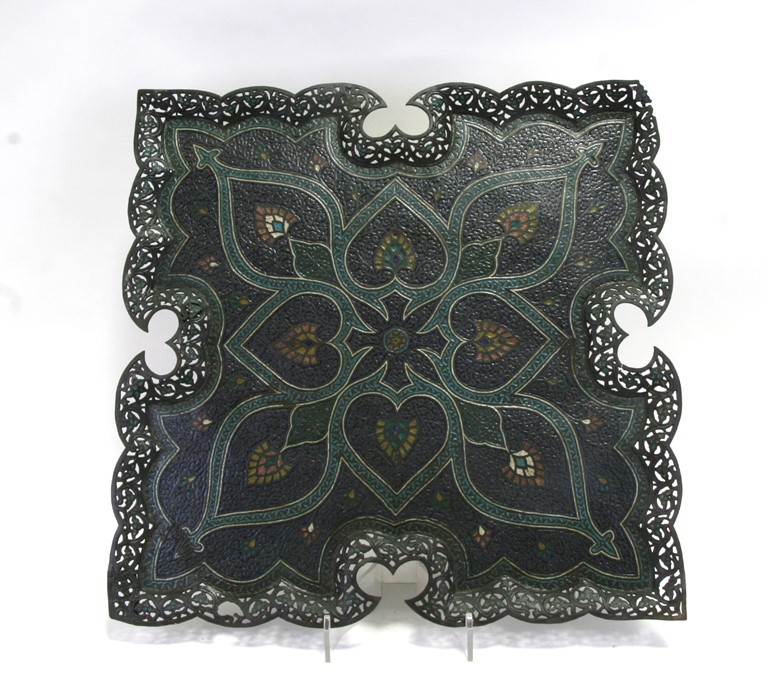 A Persian / Indian pierced metal and enamel tray decorated with stylised flowers, 54cms (21.25ins)