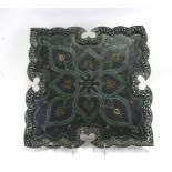 A Persian / Indian pierced metal and enamel tray decorated with stylised flowers, 54cms (21.25ins)