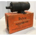 A DELCO standard universal ignition coil, as previously fitted to Aston Martin racing cars, in