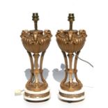 A pair of classical form painted metal and marble table lamps, 40cms (15.75ins) high (2).
