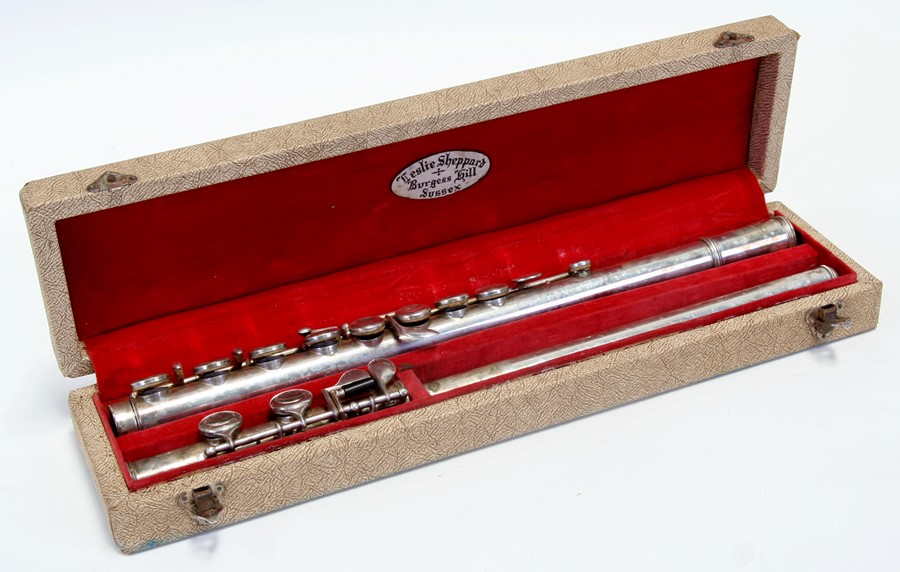 A Leslie Sheppard three-piece silver plated flute, cased.