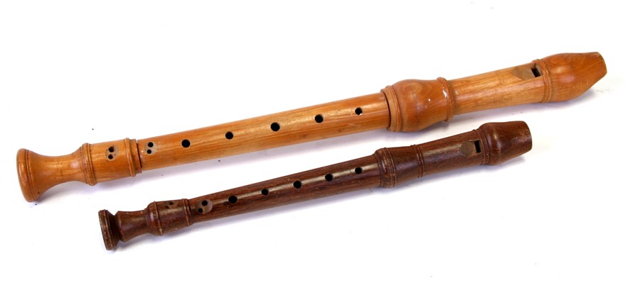 A Kung Descant Model No. 7J8 wooden recorder, 32cms (12.5ins) long; together with an Ariel Treble