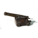 An unusual mid 20th century petrol lighter in the form of an 18th century Blomefield cannon, with