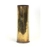 A WWI trench art brass shell case with Chinese inspired engraved decoration, 27cms high.