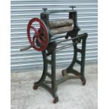 A cast iron mangle, 85cms overall width.