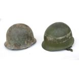 A French Army M51 helmet made by S.A.U.F. of Paris in 1953 for the first Indochina War with an