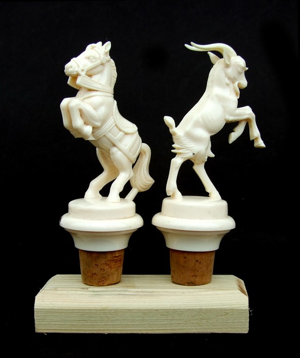 Two contemporary German bottle stoppers in the form of a rearing horse and an Ibex (2).