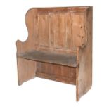 A stripped pine Welsh settle with panelled back, 98cms wide.Condition Reportheight 108cm, width