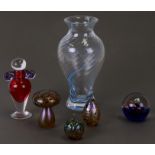 Three Isle of Wight Art glass paperweights; together with a Belle glass scent bottle; a Caithness