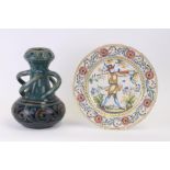 A continental Art pottery vase, 29cms high; together with a faience style continental charge,