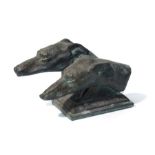 A bronzed terracotta group depicting two greyhound heads, approx 46cms wide.