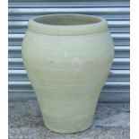 A Mediterranean terracotta garden planter. 56cm high