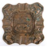 A cast bronze rectangular ashtray decorated with hunting scenes, 13cms wide.