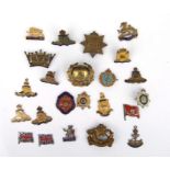 An assortment of 24 Military sweetheart brooch fronts for spares or repairs