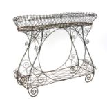 A 19th century two-tier wirework garden planter, 102cms wide.