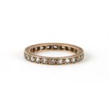 A 9ct gold white stone eternity ring, approx UK size 'L'.