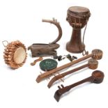 A collection of tribal musical instruments to include Lisu and Lahu lutes, an Akha drum and Mien