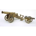 A large brass fireside cannon, overall length 44cms (17.25ins) and weighing in excess of 5kgs (11