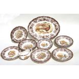 A Royal Worcester Palissy game series part dinner service to include a meat platter and bowls.