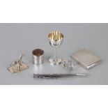 A quantity of silver items to include a Chinese miniature barrel; a card case; a propelling