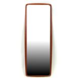 A mid century teak wall mirror, 95cms high.