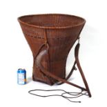 A Vietnamese woven rice collecting basket with cover and carrying straps, approx. 110cms high;