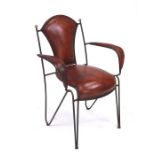 A Carlo Bugatti style open armchair with steel wirework frame and leather back rest, seat and arms.