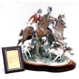 A monumental limited edition Lladro porcelain figural group - The Hunt - depicting riders on