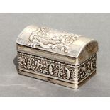 A 19th century continental silver coloured metal dome topped miniature trunk, the cover decorated