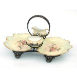 A W. Wood & Co. strawberry, cream and sugar set on a plated stand decorated with flowers on a