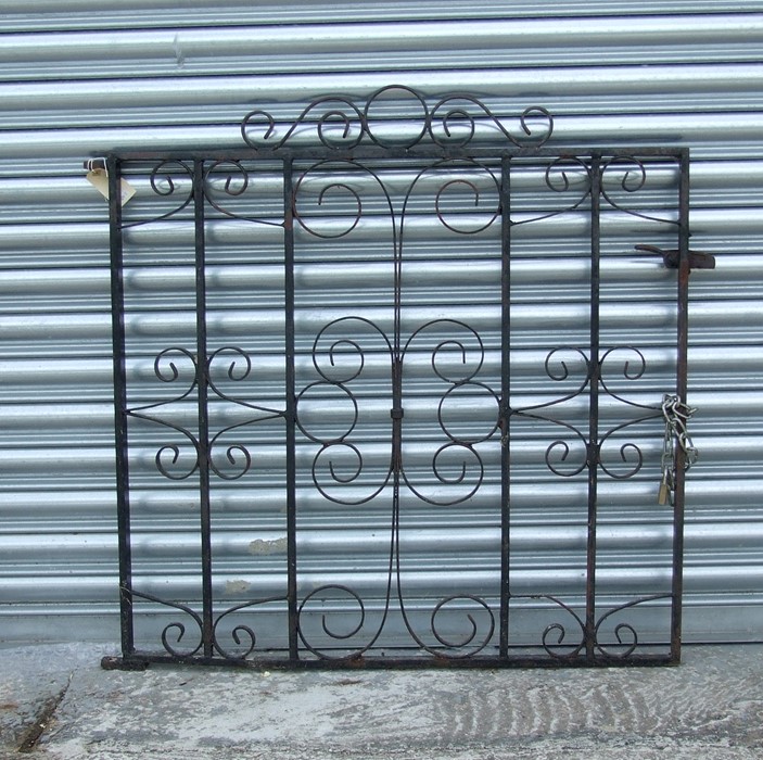 A wrought iron garden gate, 92 by 84cms.