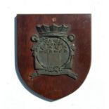 A Dutch bronze ship's plaque 'Sterker Door Strijd', mounted on a wooden plaque, 23cms wide.