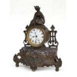 A French gilt spelter figural mantle clock, the white paper dial with Roman numerals and