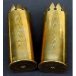 A matching pair of WW1 trench art shell case vases inscribed with Union Jack flags, American